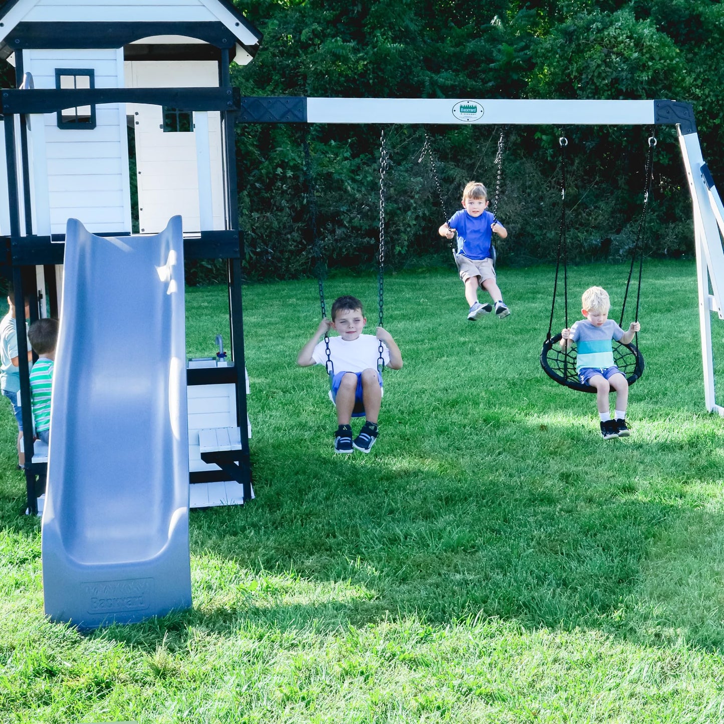 Backyard Discovery Wooden Swing Set with Slide, Clubhouse & Rock Wall
