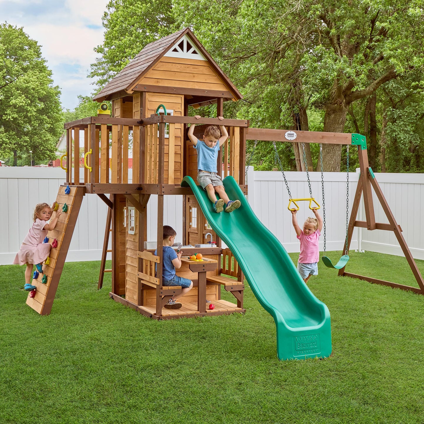 Backyard Discovery Wooden Swing Set with Slide, Clubhouse & Rock Wall